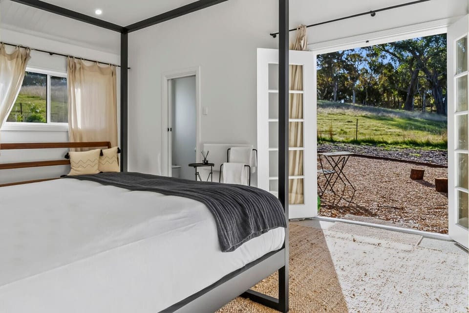 Serene bedroom with direct access to the outdoors