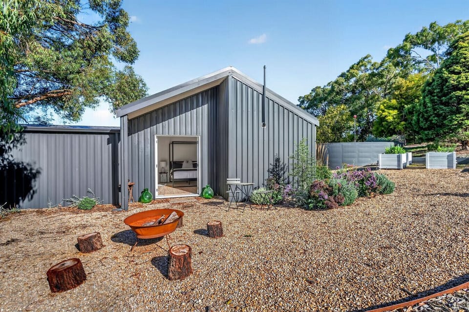 Stylish modern studio, with a private fire pit and outdoor seating.