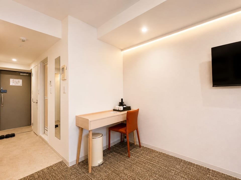 Comfort Twin Room, Balcony, City View | Living area | 32-inch LCD TV with cable channels