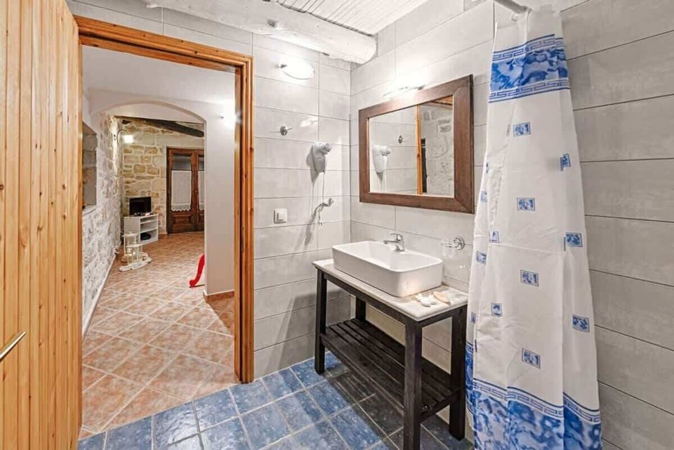 Modern Bathroom with Vanity and Mirror