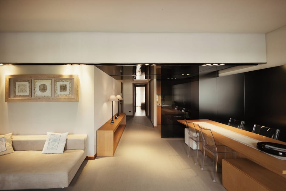Deluxe Apartment, Balcony, Lake View | Living area | Flat-screen TV