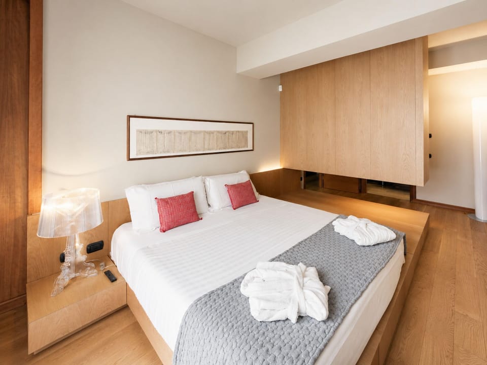 Deluxe Apartment, Balcony, Lake View | In-room safe, soundproofing, iron/ironing board, free WiFi