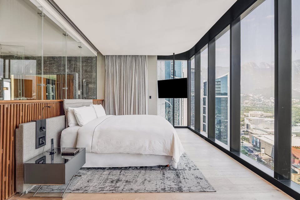 Egyptian cotton sheets, premium bedding, down comforters, minibar