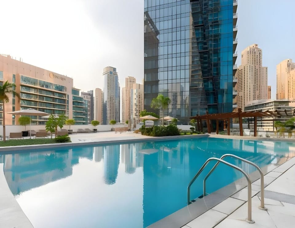 2 outdoor pools, open 8:00 AM to 10:00 PM, pool umbrellas, sun loungers