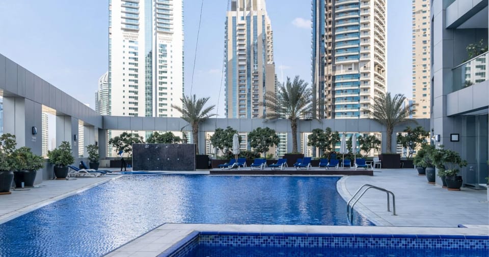 2 outdoor pools, open 8:00 AM to 10:00 PM, pool umbrellas, sun loungers