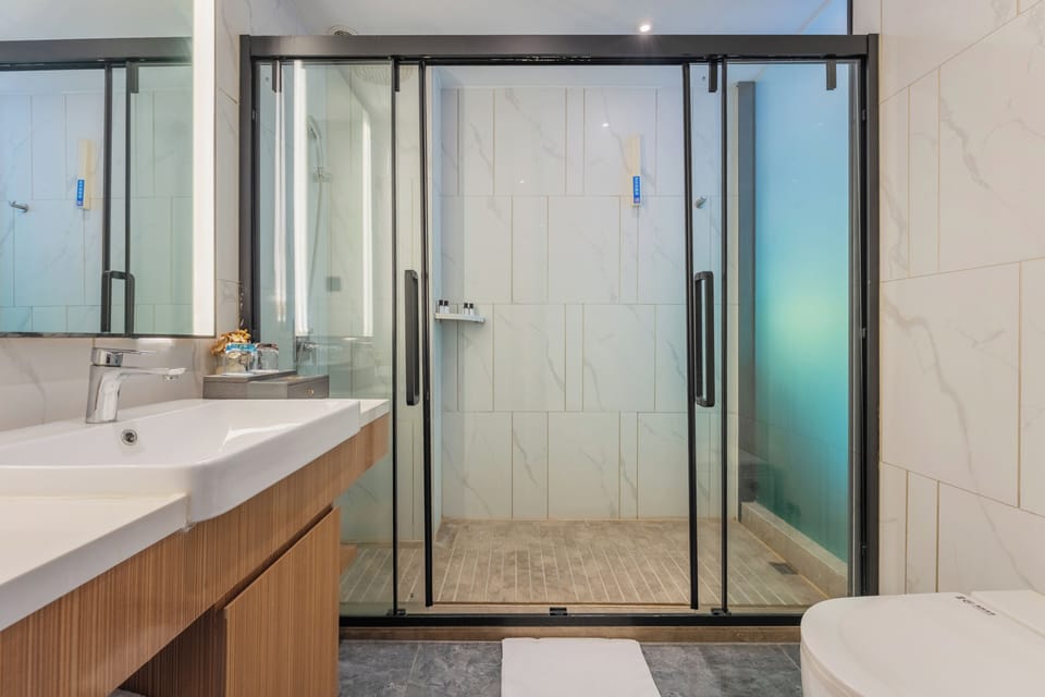 Comfort Double or Twin Room | Bathroom | Shower, hair dryer, towels, soap