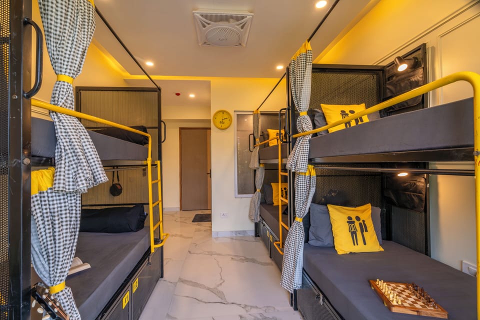 Bed in 6 Bed Mixed Dormitory with Balcony and City View | Blackout drapes, free WiFi, bed sheets