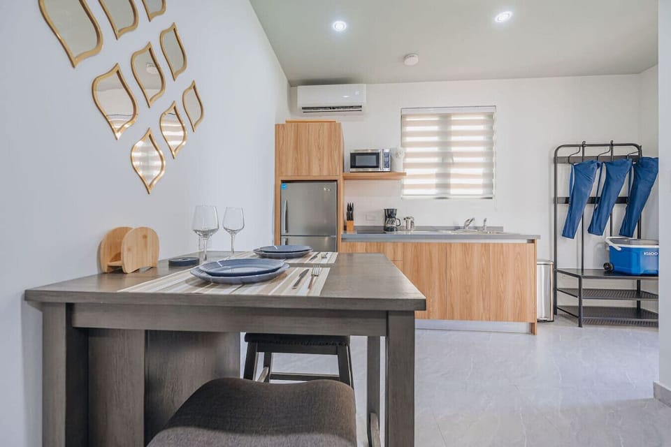 Cozy suite with spa bathroom, bright bedroom & stylish entry—perfect for a relaxing vacation stay.