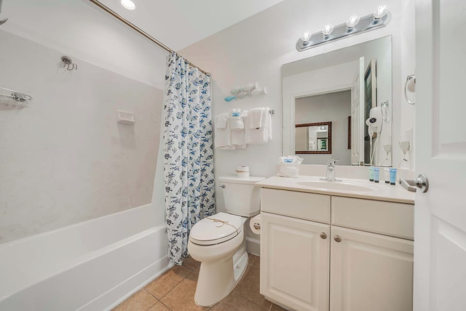 There is an additional full bathroom located just off the hall.