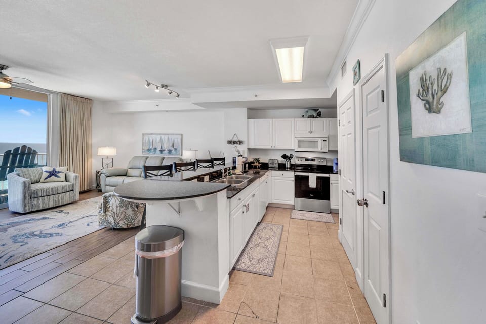 The fully equipped kitchen features granite countertops and has everything you need to prepare meals for family & friends.