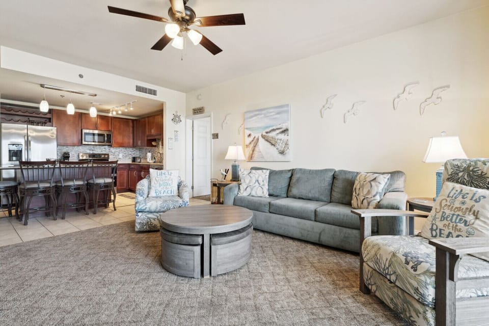 Cozy Lake View Living Room with Sleeper Sofa, Flat Screen TV and Private Balcony Access