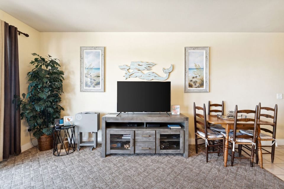 Cozy Lake View Living Room with Sleeper Sofa, Flat Screen TV and Private Balcony Access
