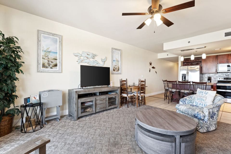 Cozy Lake View Living Room with Sleeper Sofa, Flat Screen TV and Private Balcony Access
