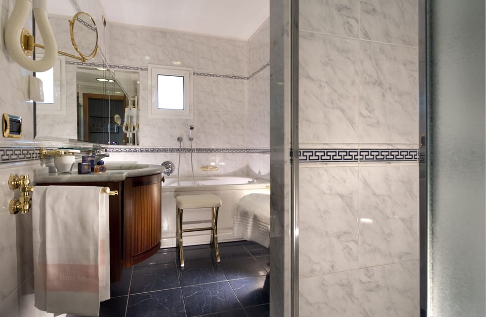 Deluxe Suite, Terrace, Sea View | Bathroom | Shower, free toiletries, hair dryer, bidet