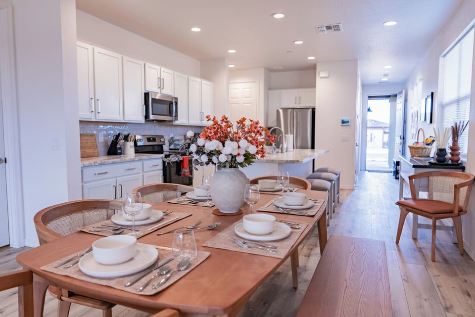Spacious kitchen and dining area with modern appliances