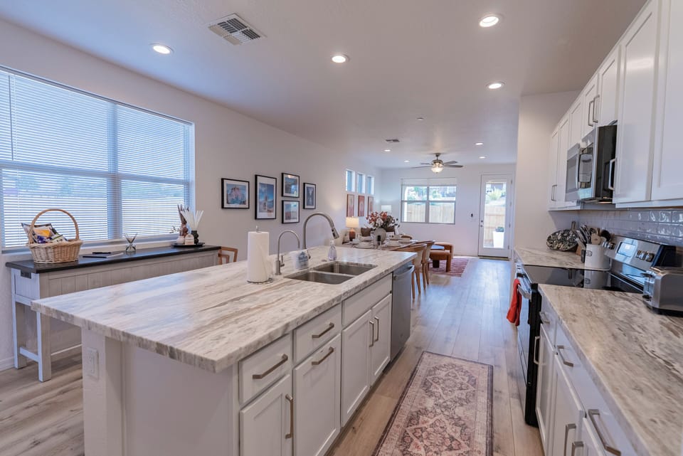 Island perfect for morning coffee or evening meal prep.