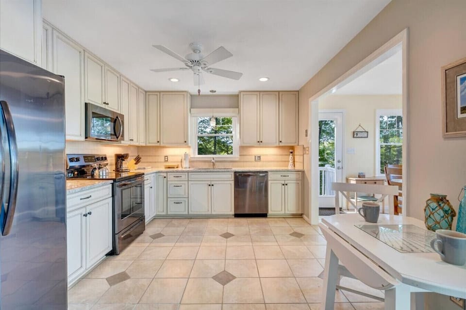 Prepare dinner for the family in the well equipped kitchen.