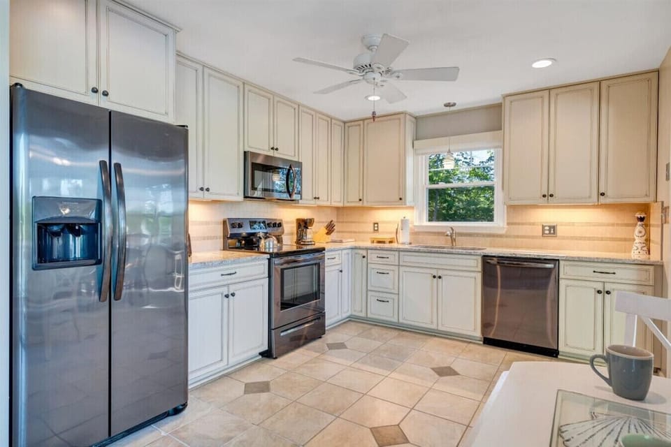 Prepare dinner for the family in the well equipped kitchen.