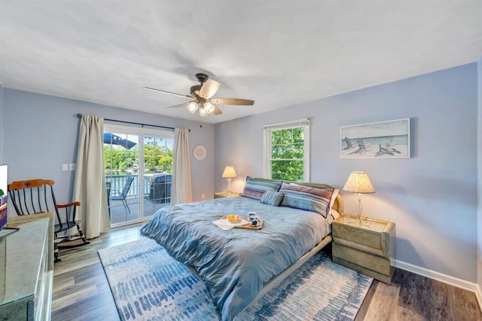 Recharge and refresh in the comfortable lakeside master with a King bed.