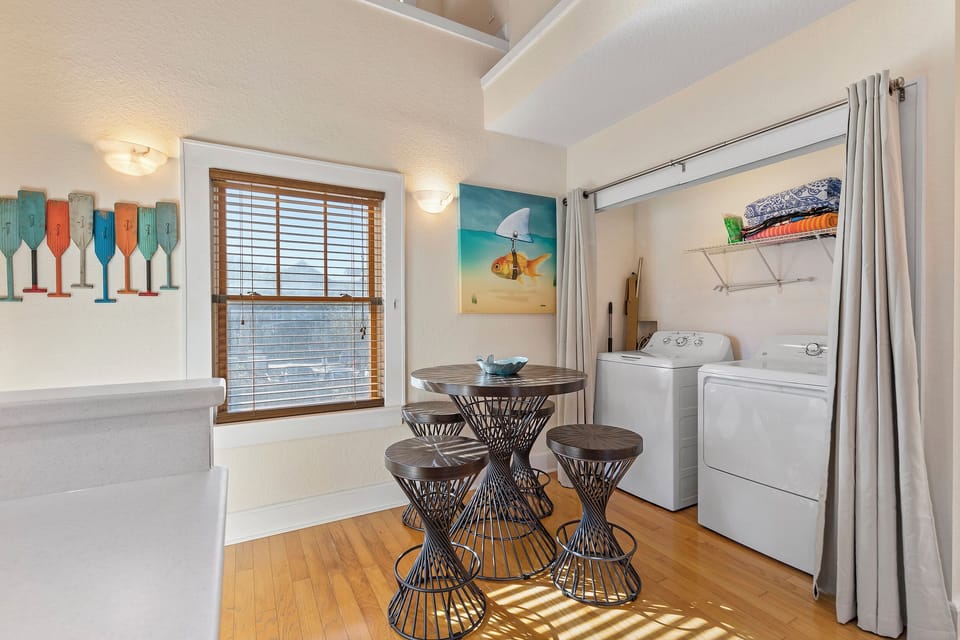 Seating for four at the dining table + upstairs washer/dryer