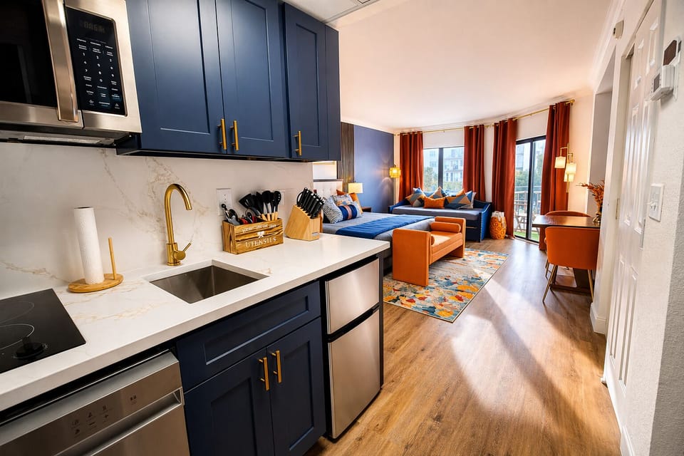 The kitchen is equipped with a freezer, mini-fridge, dishwasher...
