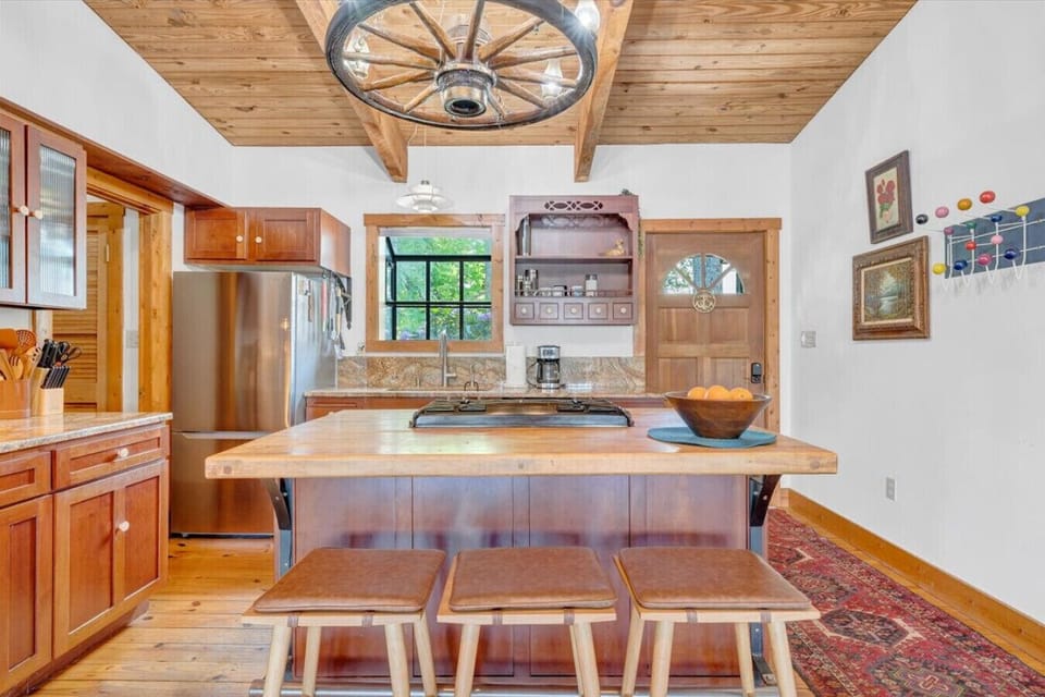 The heart of the home, this inviting kitchen is perfect to cook, dine, and connect.