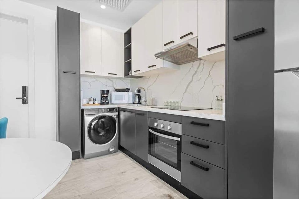 Apartment, 1 Queen Bed with Sofa bed, Patio, City View (The Towers F109) | Private kitchen