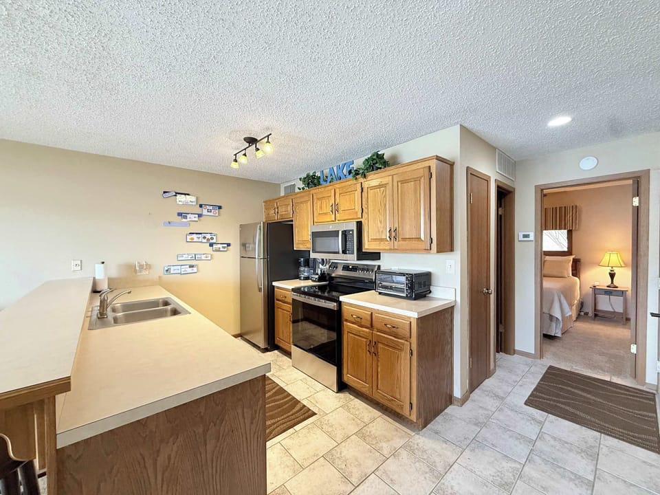 The open kitchen offers ample space & all the comforts of home​