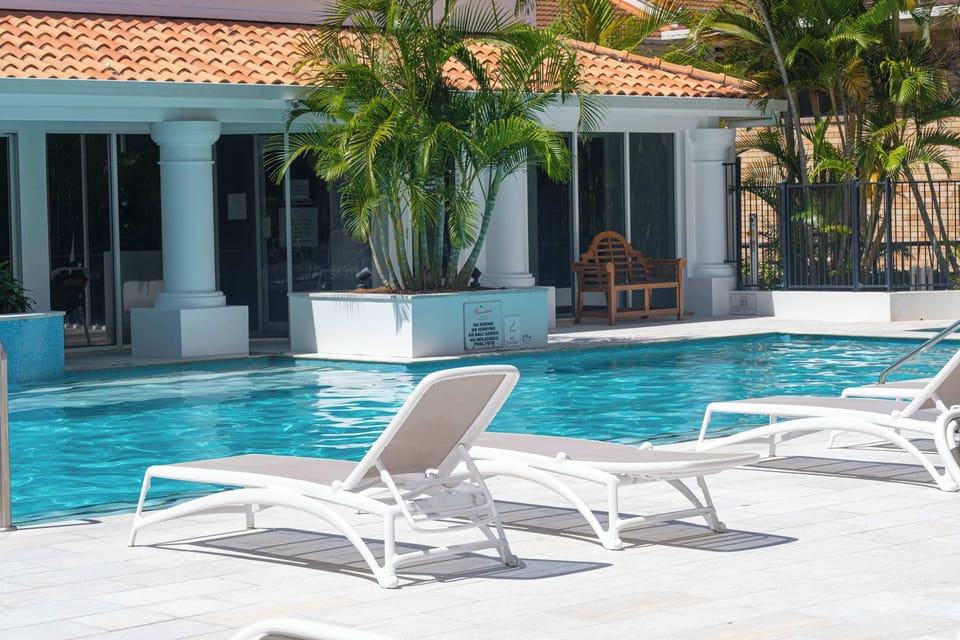 Dive into Paradise. Your Tropical Poolside Escape Awaits
