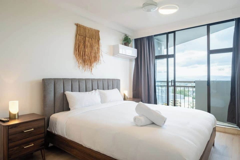 Cozy Bedroom Retreat – Unwind in a beautifully designed bedroom with plush bedding and a serene atmosphere for restful sleep.