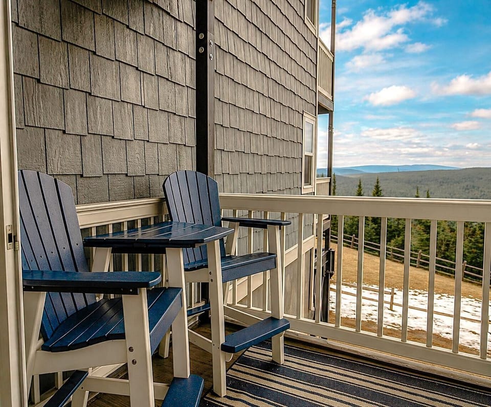 Take in sweeping mountain views right from the deck.