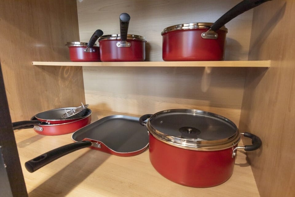 Fully stocked with pots, pans and cooking essentials