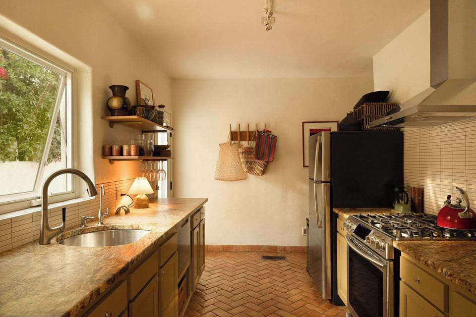 Chef’s Dream Kitchen – Fully stocked with high-end appliances and plenty of cabinetry, making cooking a breeze. 