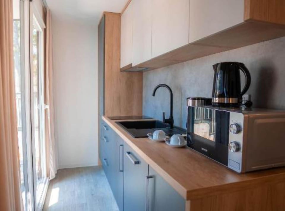 House (Two bedroom home with private hot tub) | Private kitchen | Fridge