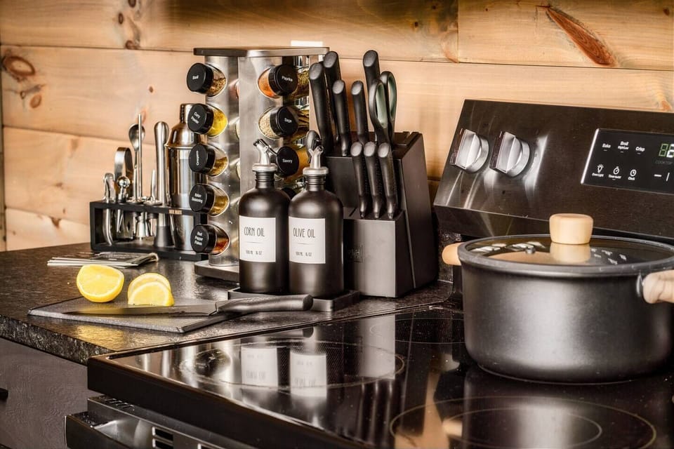 Fully stocked kitchen with quality cookware, spices, and essentials—ideal for preparing meals just like at home.