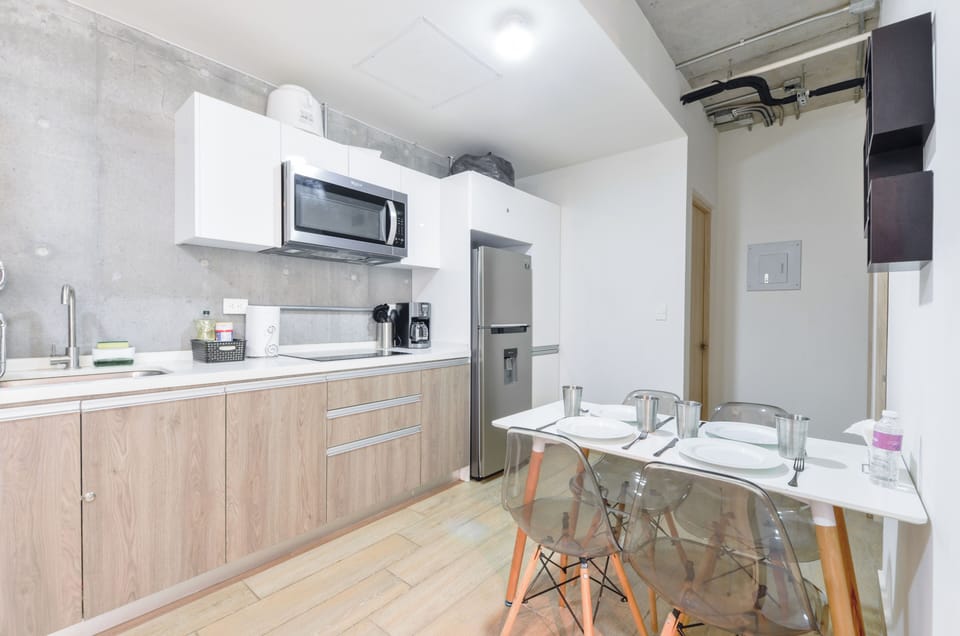 Comfort Suite, City View | Private kitchen | Full-size fridge, microwave, stovetop, blender