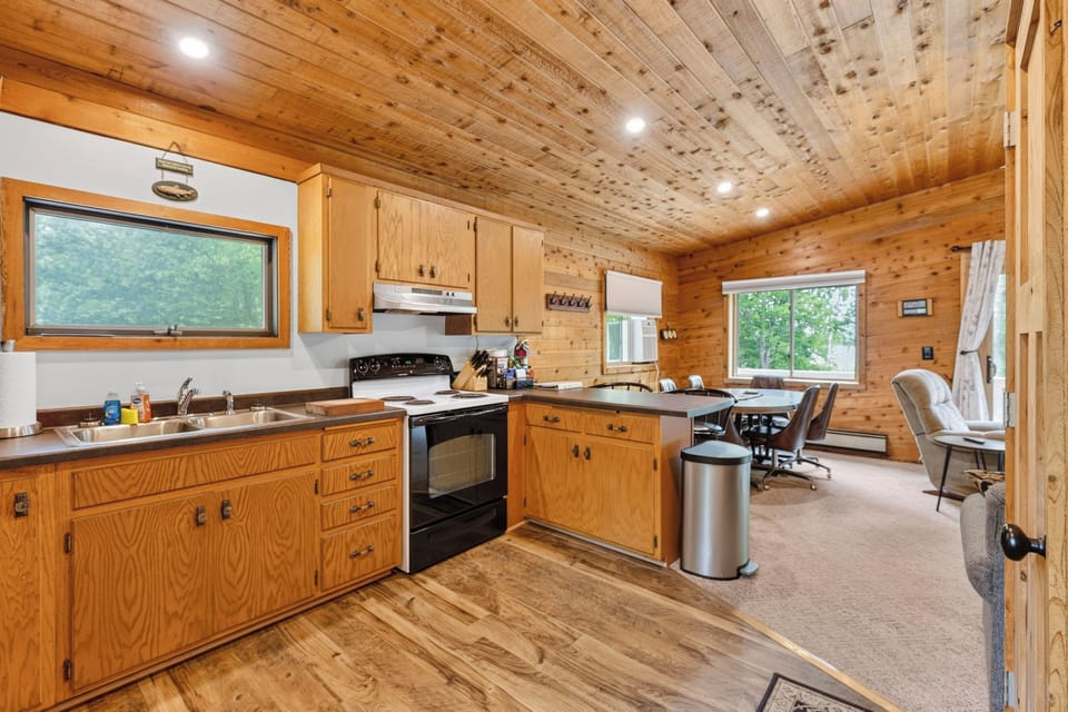 Open concept with he kitchen, dining and living room area.