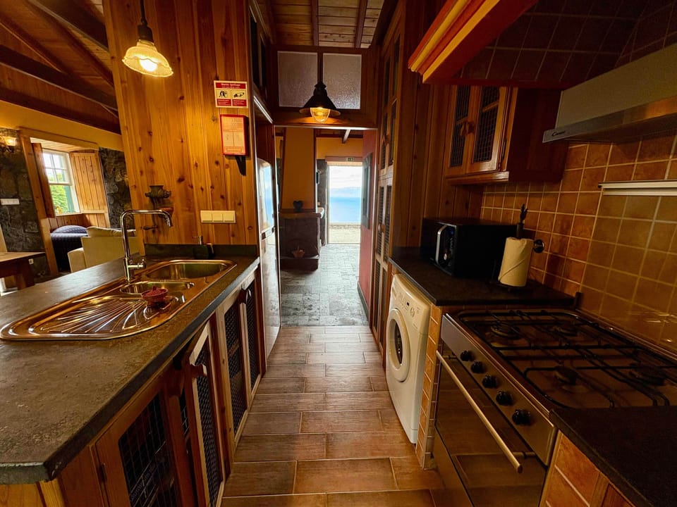 Kitchen with view of entryway