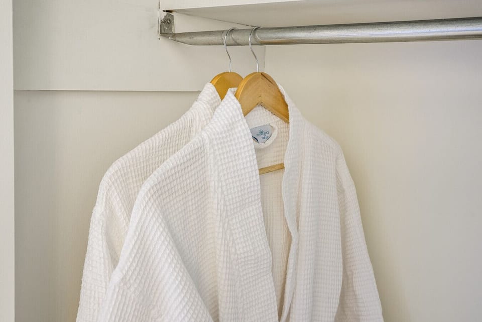 Plush waffle-knit robes to enhance your spa-like relaxation and comfort.