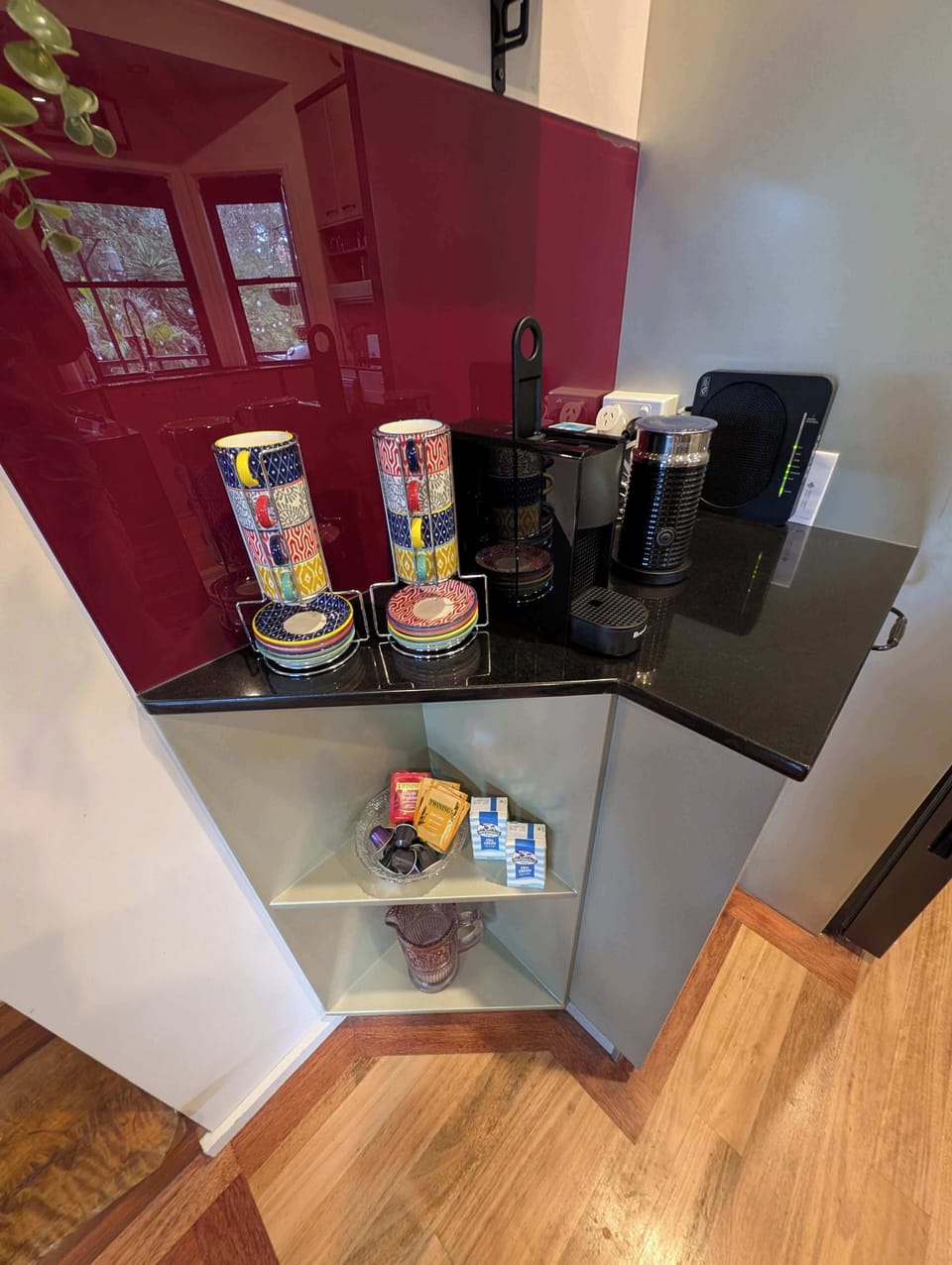 Coffee station with tea, coffee and milk provided for guests