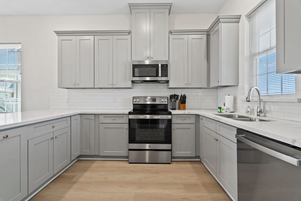 Bright, clean kitchen with everything you need to cook and unwind.