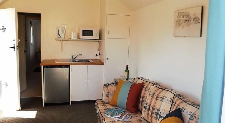 Cottage, 1 Queen Bed with Sofa bed, Garden View (The Garden Cottage) | Living area | Flat-screen TV