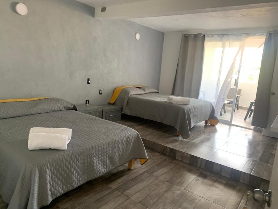 Family Room, Balcony, Courtyard View | Iron/ironing board, WiFi (free)