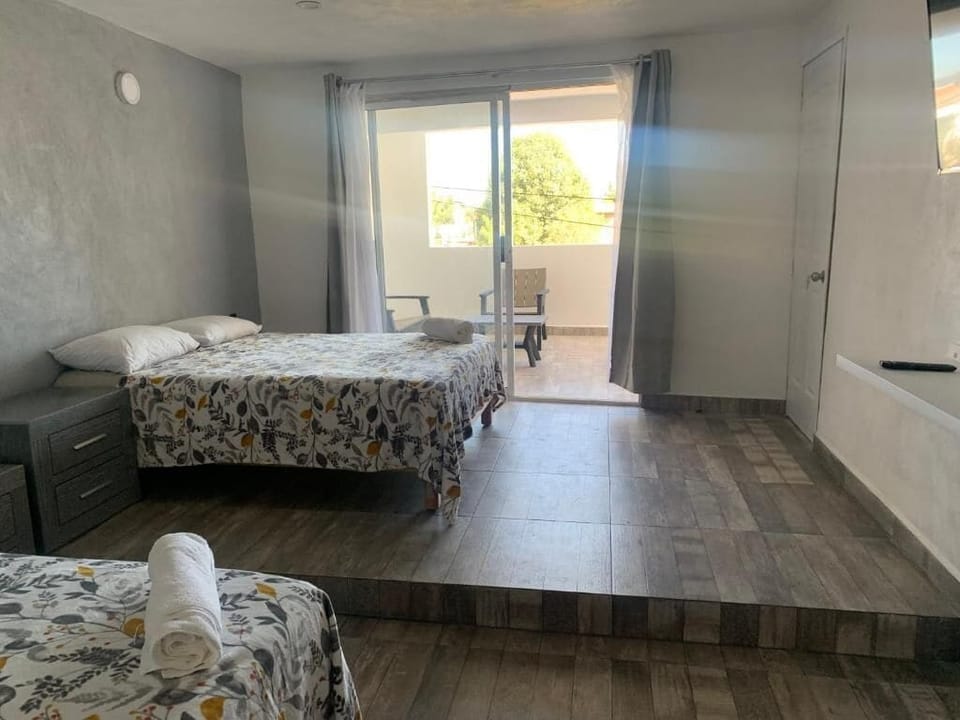 Family Room, Balcony, Courtyard View | Iron/ironing board, WiFi (free)
