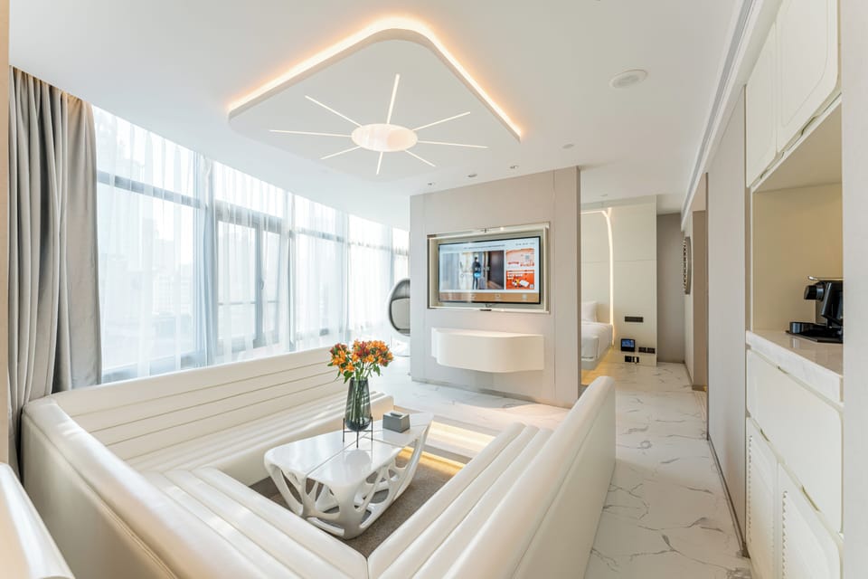Signature Studio Suite | Premium bedding, down comforters, memory foam beds, free minibar