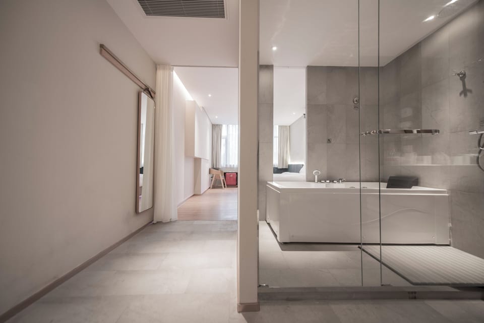 Shower, hydromassage showerhead, designer toiletries, hair dryer