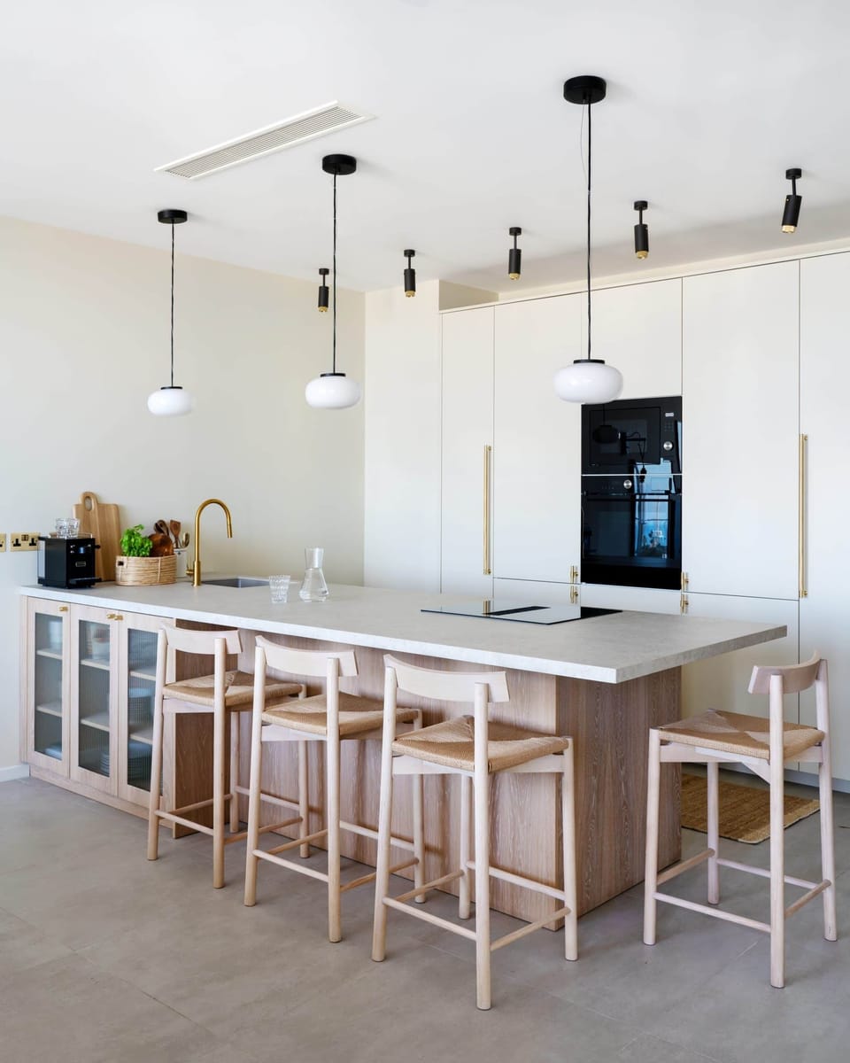 Kitchen - a bright, social kitchen with a spacious island-perfect for cooking
