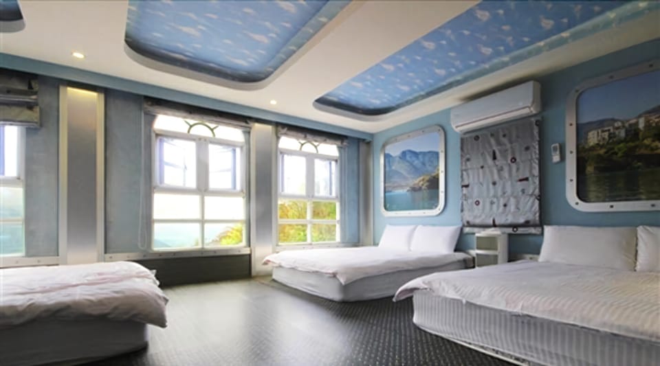 Deluxe Room (6 persons) | Down comforters, blackout drapes, free WiFi, bed sheets