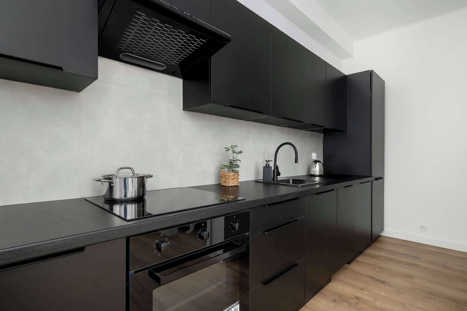 The fully equipped kitchenette includes everything you need for a home-cooked meal.