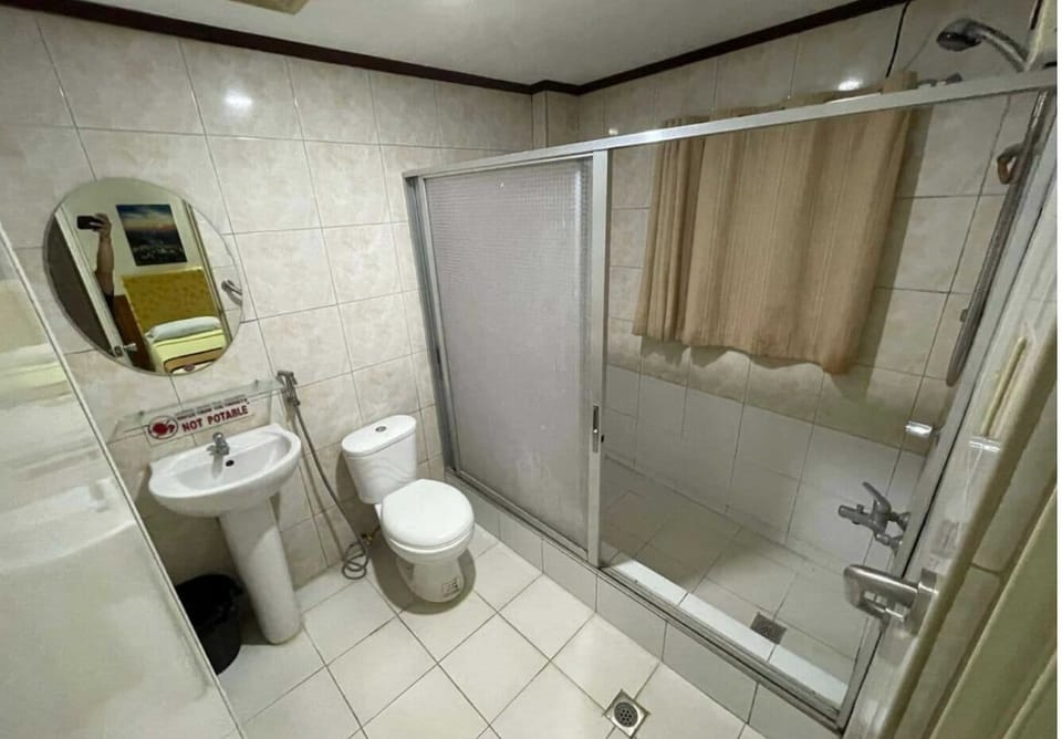 Standard Double Room | Bathroom | Shower, free toiletries, slippers, towels